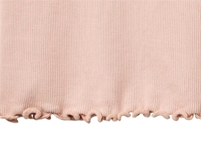Detalje af Wheat Minka top powder i rib
