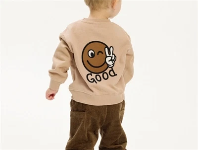 Sweatshirt i humus fra THE NEW siblings med smiley print foran og bagpå  