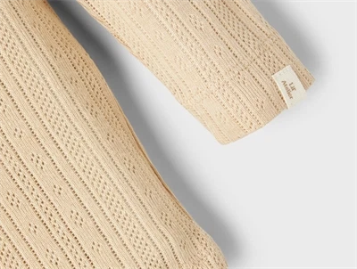 Lil Atelier top warm sand hulmønster