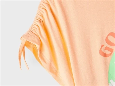 Name It peach nectar top glimmer