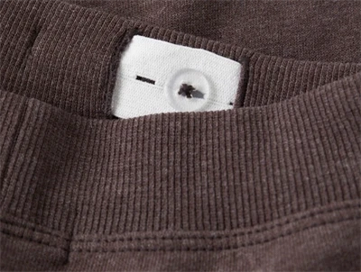 Name It sweatpants french roast med lynlåslommer