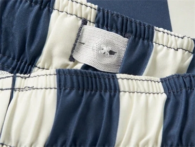 Name It badeshorts blå og råhvid striber talje detalje