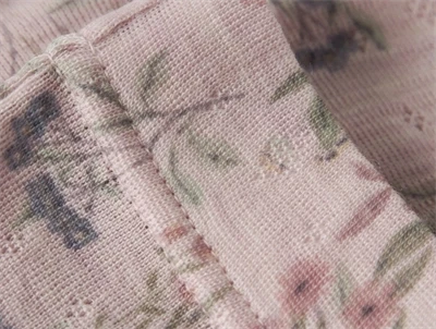 Name It lilla undertøj i merinould til børn med blomster