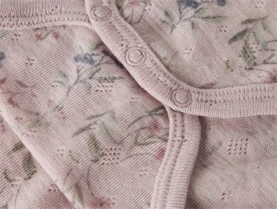 Name It lilla bodystocking i merinould til baby med blomster