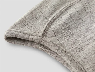 Detalje af Name It babyhue i satellite merinould