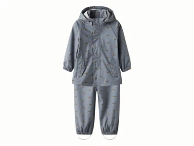 Lil' Atelier regnsæt i blå nuance med hvalprint og aftagelig hætte