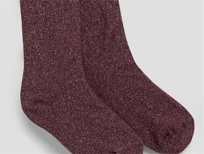 Detalje af burgundy strømpebukser med glimmereffekt fra Name It