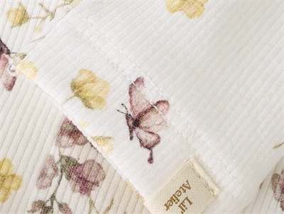 Lil\' Atelier leggings coconut milk med blomster og flæser