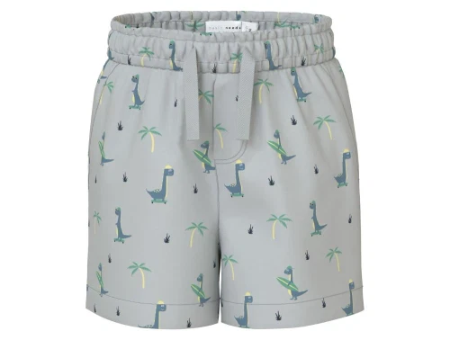 lysegrå shorts fra name it med print af dinosaurer og palmer over hele stoffet
