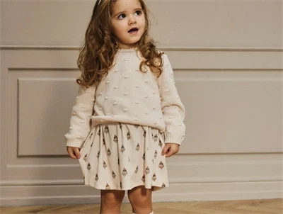 Lil’ Atelier kjole pastel parchment med klovneprint