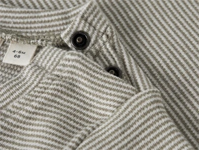 Lil\' Atelier body i brun nuance med trykknapper