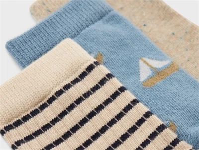 3-pak strømper i peyote og blå spring lake fra Name It med sejlskibsmotiv