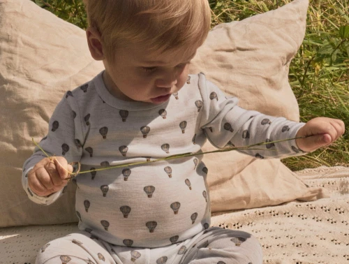 Lil\' Atelier merinould body i lyseblå nuance med luftballonprint