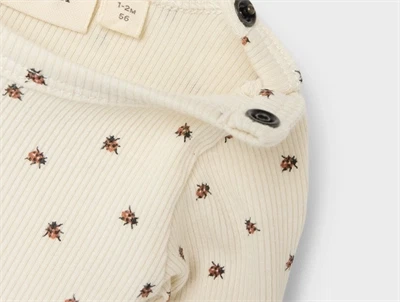 Lil Atelier body turtledove med mariehøner