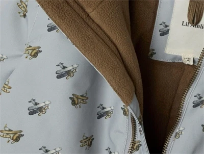 Lil\' Atelier flyverdragt ultimate grey med flyprint og fleecefor