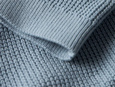 Name It striktrøje i støvet blå nuance med strukturstrik og rund hals