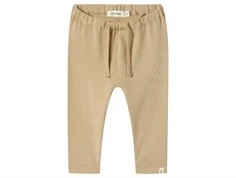 lil' atelier bukser i beige med bindebånd og ribstruktur, set forfra