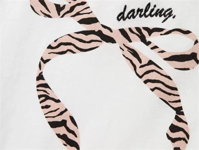 Name It top detalje af zebra sløjfe print i hvid nuance