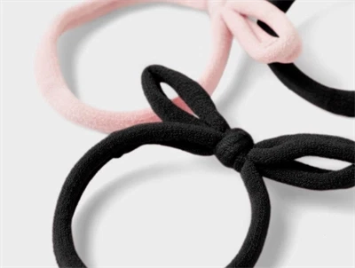 Name It hårelastik med sløjfe detalje i sort og lys lilla