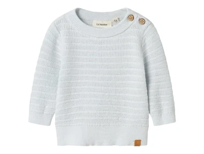 Lil' Atelier striktrøje i ancient water med knapper på skulderen