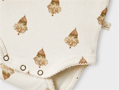 Lil\' Atelier BABY body i pastel parchment med klovneprint