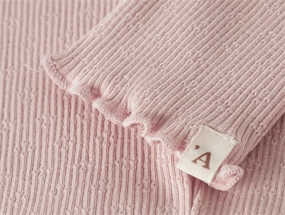 Lil\' Atelier BABY leggings i cameo rose med flæsekant