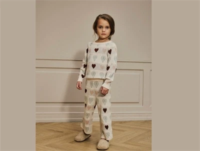 Lil\' Atelier MINI bukser i creme nuance med mønster af hjerter og luftballoner