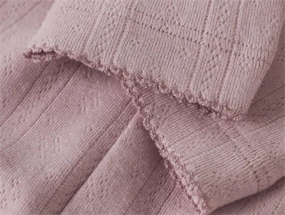 Name It leggings i lys lilla med hulmønster  