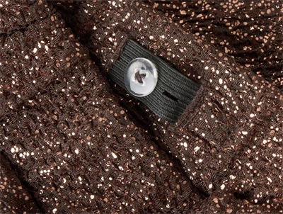 Name It glimmerbukser i hot fudge set tæt på detalje