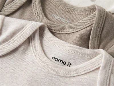 Name It baby body 3 pak i råhvid og beige med elefant og dyreprint