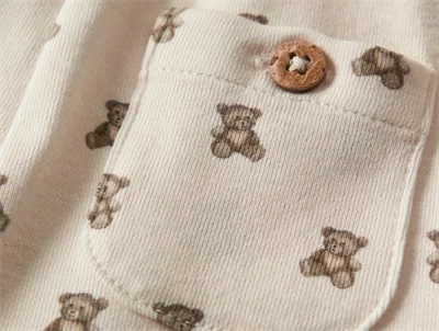 Lil\' Atelier BABY bukser i råhvid nuance med teddybjørnprint  
