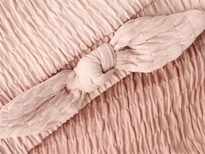 Lil\' Atelier bikini i fersken nuance med sløjfedetalje foran