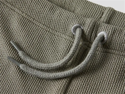 Lil\' Atelier badebukser i grønbrun nuance med elastik i taljen