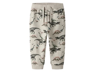 Name It sweatpants i lys beige nuance pumice stone med dinosaurprint