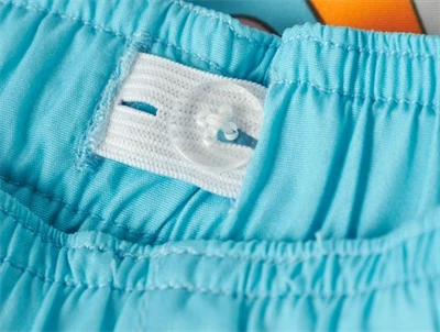 Name It børne badeshorts med Stitch print og justerbar elastik