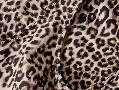 Detaljebillede af Name It badedragt leopardprint brun og beige