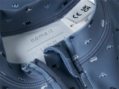 Name It uv badedragt til børn med lynlås foran