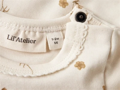 Lil\' Atelier body coconut milk med trykknap ved skulder
