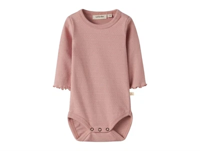 Lil\' Atelier body i rosa nuance med hulmønster