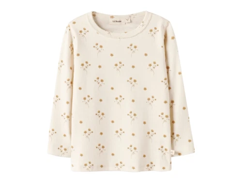 Lil\' Atelier bluse i råhvid nuance med blomsterprint