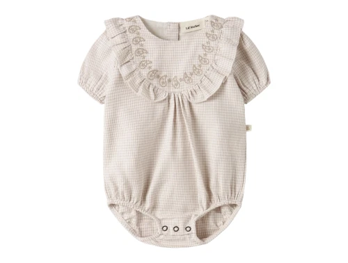 Lil\' Atelier body i råhvid nuance set forfra