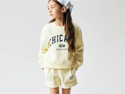 Name It sweatshirt i gul nuance med chicago print