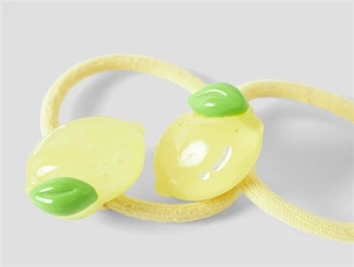 Name It hårelastik i gul nuance med citron detalje