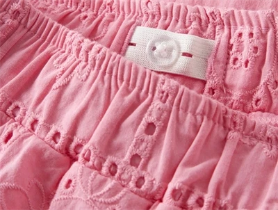 Name It bukser i pink drink med hulmønster detalje af talje