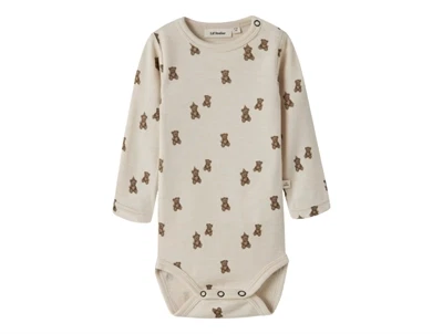 Lil' Atelier merinould body i råhvid nuance med bamseprint