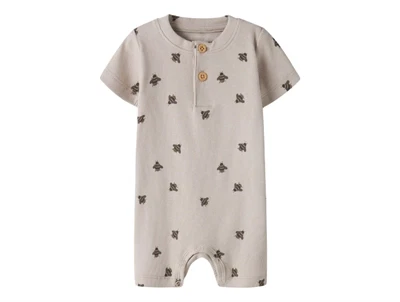 Name It sommersuit i beige nuance med bi print