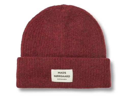 Mads Nørgaard hue i winery med ribstruktur og logo foran