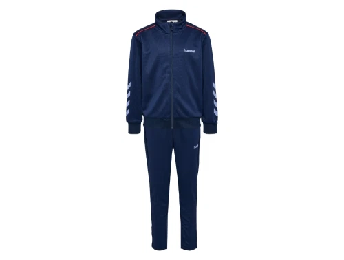 Hummel traeningssaet i moerkeblaa med roed piping set forfra