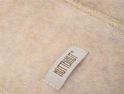 Huttelihut hjelm camel melange med logomærke