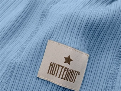 Huttelihut logo på elefanthue windward blue